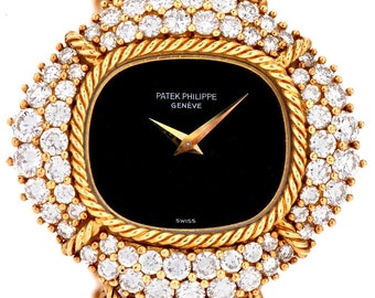 1970s Patek Philippe Diamond Onyx Dial 18k Gold Watch