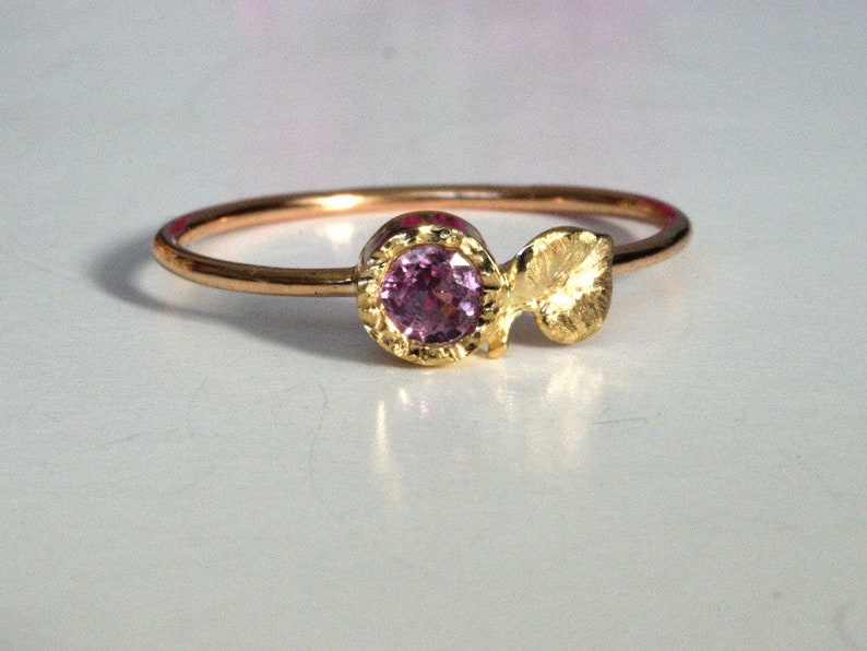 Embrace the Beauty of Nature with this Handmade 14K Gold Pink Sapphire Engagement Ring, Featuring Romantic Heart and Leaf Accents - A Truly Enchanting and Thoughtful Gif