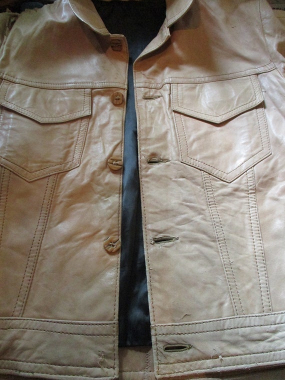 A Distressed Leather Jacket - image 9