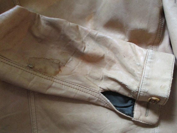 A Distressed Leather Jacket - image 6