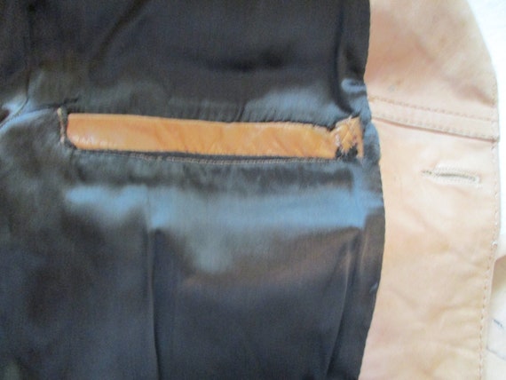 A Distressed Leather Jacket - image 5