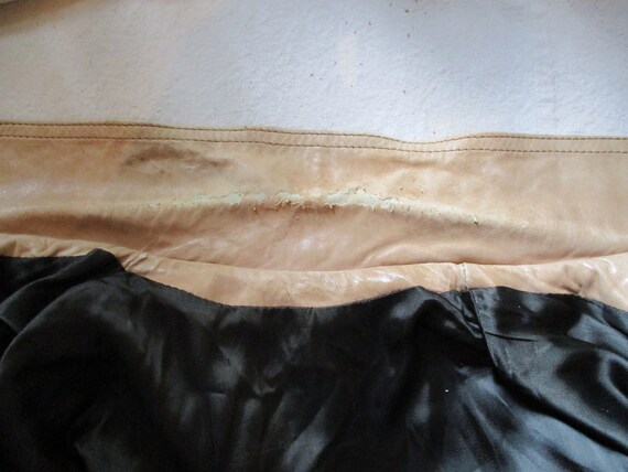 A Distressed Leather Jacket - image 8