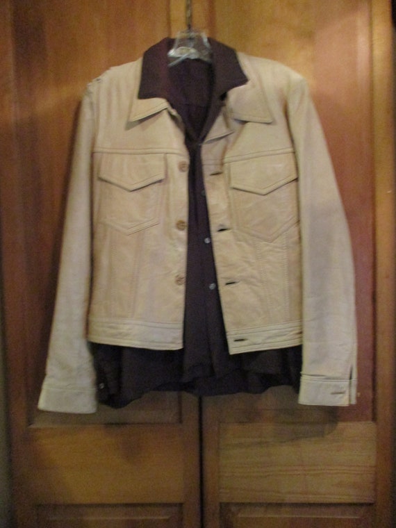 A Distressed Leather Jacket - image 1