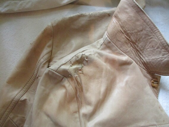 A Distressed Leather Jacket - image 7