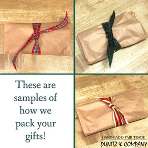 assorted packets wrapped in light brown kraft tissue paper and various ribbons. This is how we package our jewelry.