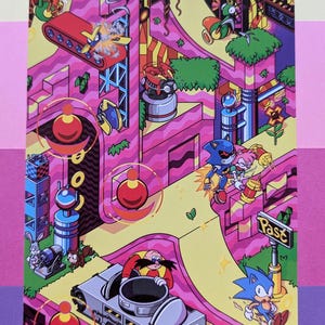 May include: A colorful illustration of Sonic the Hedgehog and friends in a retro video game style. The characters are running through a pink and yellow landscape with a large, gray robot in the foreground. The text "Past" is visible on a signpost.