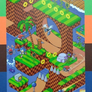 May include: A colorful pixelated illustration of a video game level with a blue hedgehog character, a green palm tree, and a variety of enemies. The level features a checkered pattern, green grass, and a blue sky.