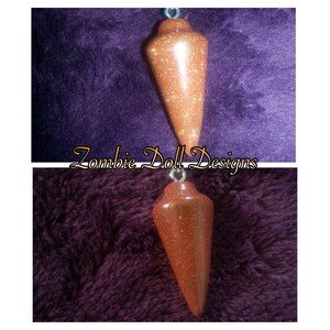 Gorgeous goldstone pendulum necklace! Shimmer and shine :-)