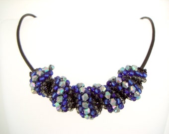 Stormy Blue Cellini Spiral blue and gray beaded statement necklace on leather cord