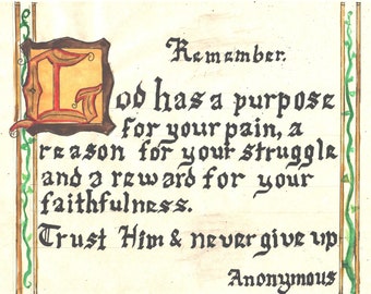 May include: A handwritten quote in black ink on a cream-colored paper background with a decorative border. The quote reads: "Remember. God has a purpose for your pain, a reason for your struggle and a reward for your faithfulness. Trust Him & never give up. Anonymous."