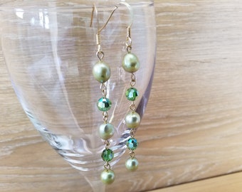 22 k gold plated Long dangle earring made  with green cultured pearl and Swarovski crystal