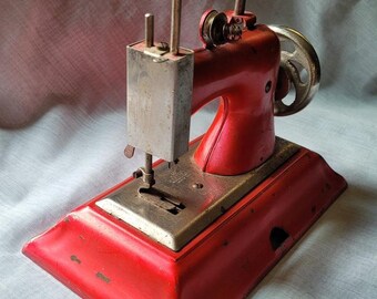 Vintage Casige Child's Hand Crank Red Sewing Machine British Zone