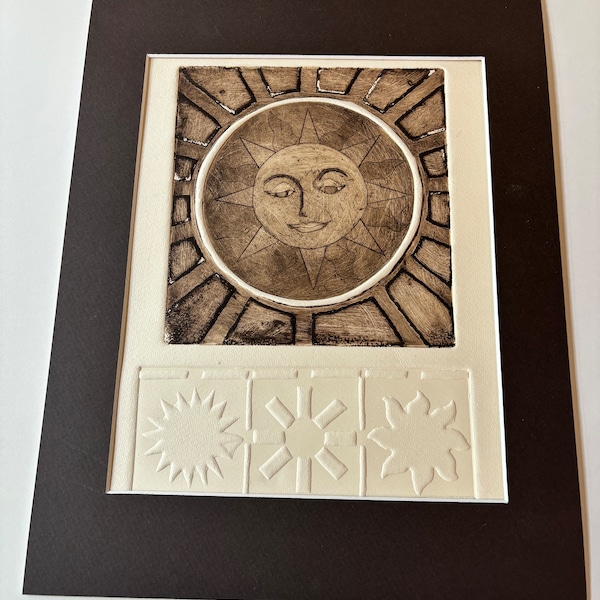 Sun Face Embossed Etching