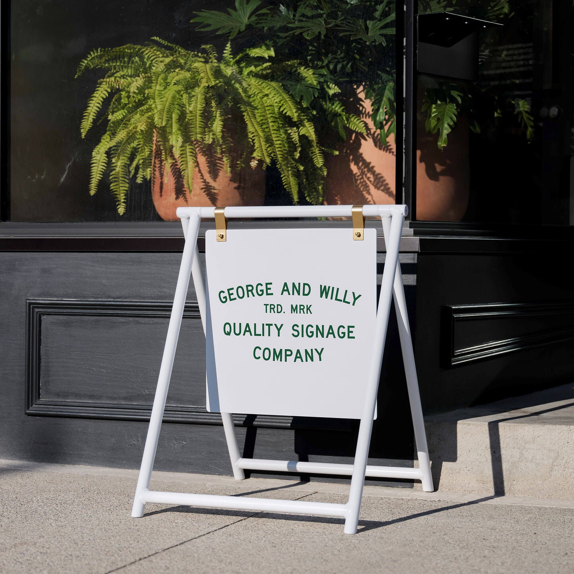 A-frame Sidewalk Sign Under New Ownership With Graphics On Each Side 