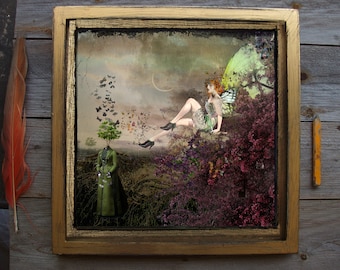 May include: A framed artwork featuring a surreal scene with a woman with butterfly wings sitting on a rock surrounded by flowers and a tree with a human head. The woman is wearing a green dress and has long brown hair. The background is a cloudy sky with a crescent moon.