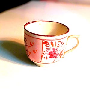 Early 20th Century Pink & Copper Luster Soft Paste 2-1/2" Footed Cup. See Description. INV#1201M