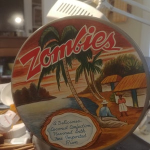Outstanding Mid-Century &quot;Zombies&quot; Coconut-Rum 1 Pound Tin. Best Condition of any Listed! INV#1465.