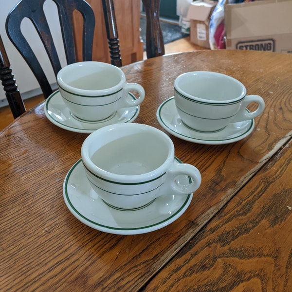 Three Quasi-mixed Buffalo and Sterling Restaurant Ware 2-3/8" Cups and 5-3/8" Saucers. All Undamaged and Without Evidence of Wear. INV#0600