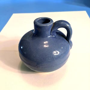 Circa 1930-4's UHL Pottery 3-1/2' Med. Blue Mini Jug. Undamaged, With Some Glaze Imperfections, Drips etc. Rough Base Bottom. INV#1729B