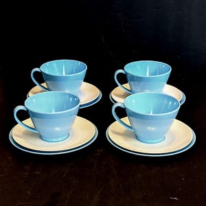 MCM Four Sets of Lenox Lenotex Melamine Turquoise & White Cups, Saucers and Bread Plates. INV#1102