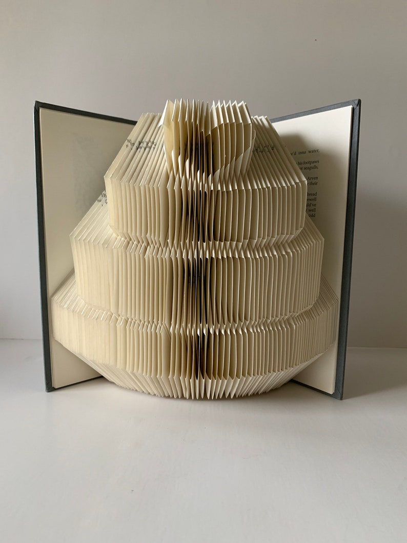 Book fold pattern Book sculpture Origami book art Pattern book Cake sculpture Tried and Tested Mark and Measure Book art Book folding art