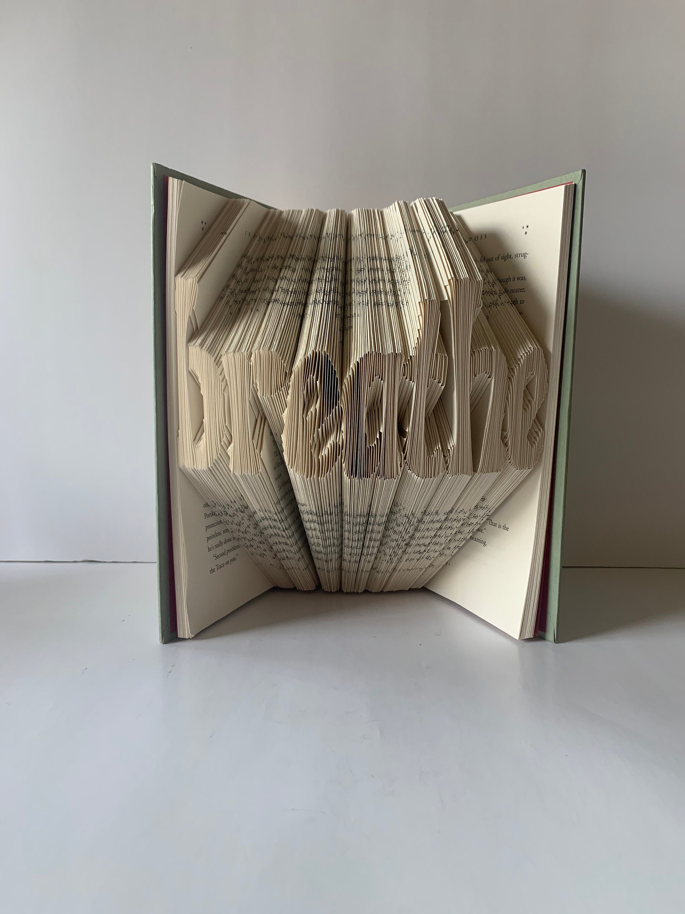 Folded book pages into words Breathe book fold Book sculpture Etsy