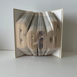 Page folding pattern Book folding pattern Beach sculpture Pattern book Tried and Tested Mark and Measure Folded pages Book page Folding art