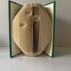 Book pattern Bowling ball Book sculpture Tried and Tested Mark and Measure Book fold pattern Page folding pattern Origami book art Book art