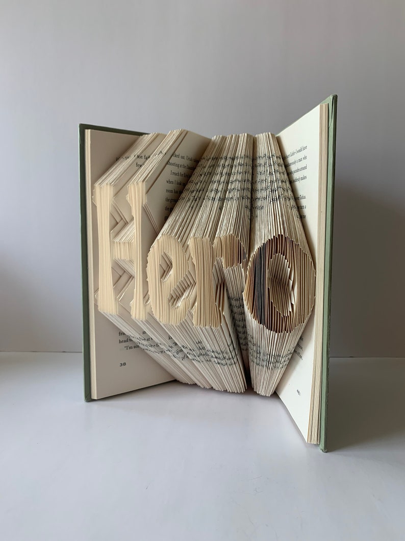 Book sculpture Folded book pages into words Personalized gift Etsy