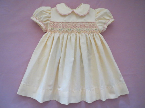 yellow smocked baby dress