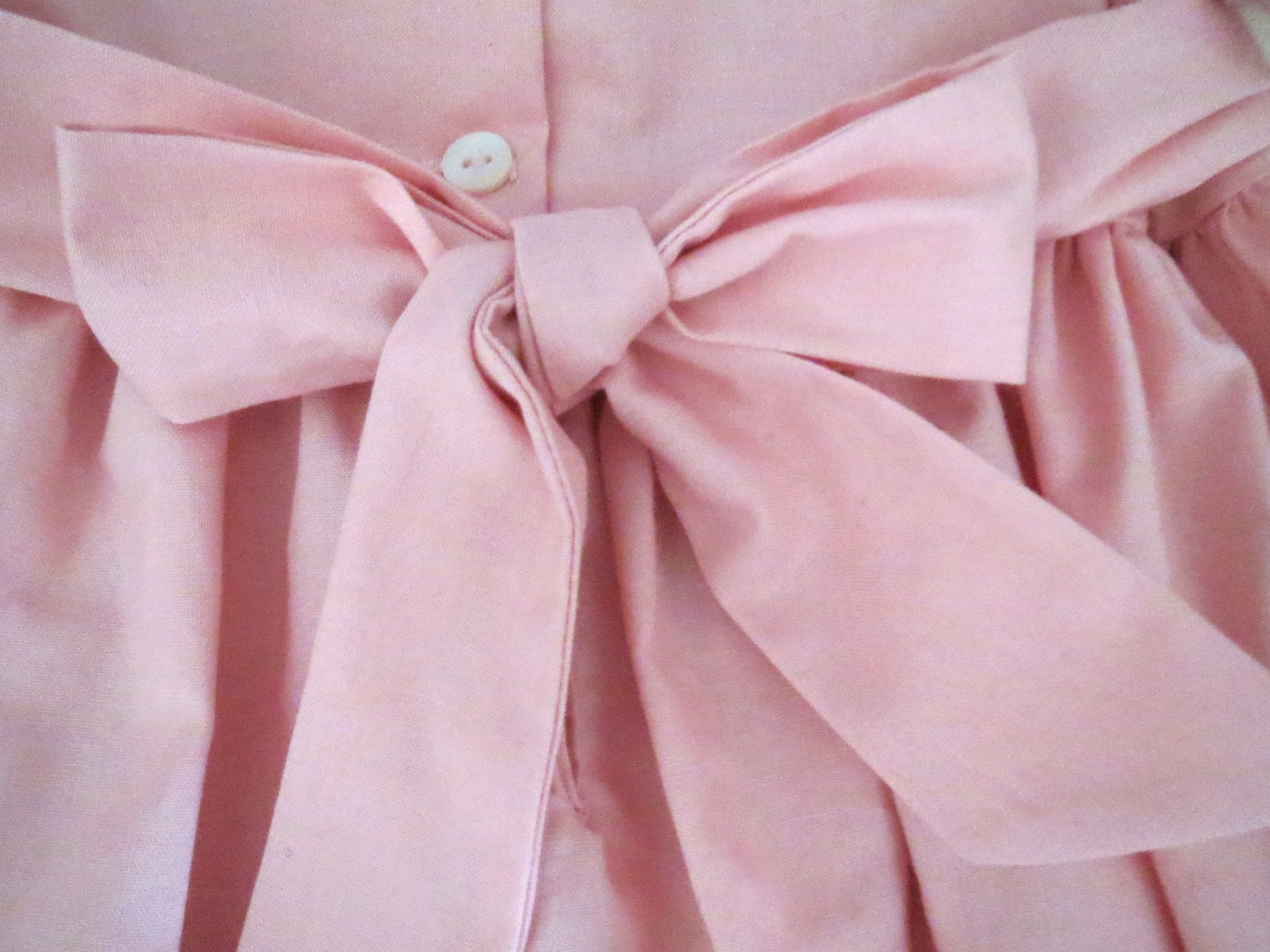 LuLu BeBe Girls White Dress - Pastel Smocking - Pink Side Bows main image 0
