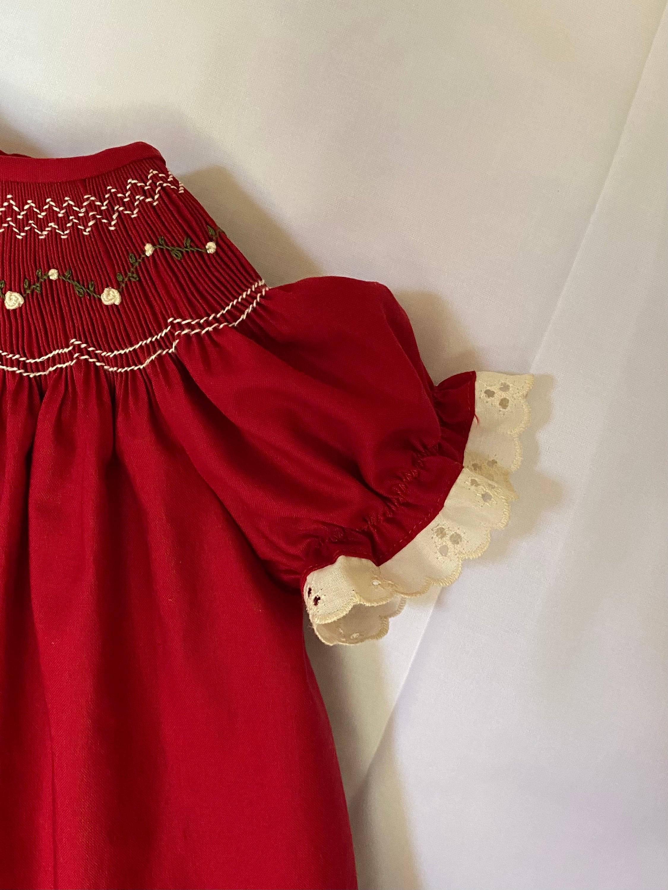 white christmas dresses Blakely Red Bow Christmas Bishop Smocked Dress – Lillie & Lilah main image 1