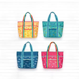 four colorful tote bags with unique patterns and names, arranged in a grid-like pattern on a white background.