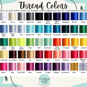 May include: A color chart titled "Thread Colors" with a variety of thread colors, including white, ivory, gray, black, navy, blue, green, orange, pink, and purple. The chart also includes the text "Multiple Monograms."