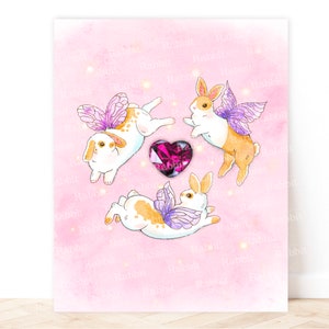 May include: Three white and brown rabbits with purple wings and a pink heart in the center on a pink watercolor background.