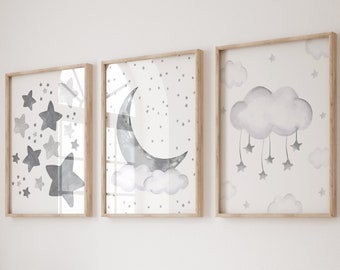 May include: A white daybed with a beige blanket and pillows, a wooden rocking horse, and three framed prints with watercolour illustrations of stars, a crescent moon, and a cloud with stars hanging from it.