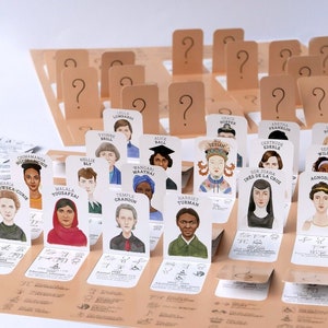 Who's She? guessing game about women. Paper version of educational Guess Who including stories of Frida Kahlo, Marie Curie or Serena Williams. Consists of 2 boards with portraits and 28 cut-it-yourself biography cards.