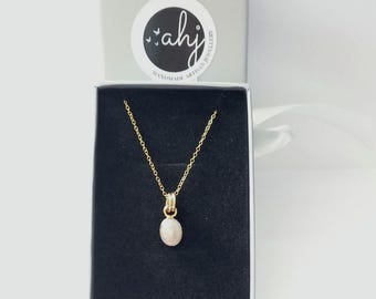 9ct gold cremation ashes pendant, an oval shaped memorial keepsake necklace handmade in gold, hair memento, pet remembrance gift