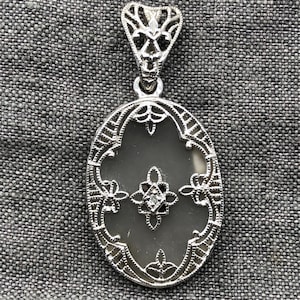 Vintage Sterling Silver Diamond and Camphor Glass Filigree Pendant