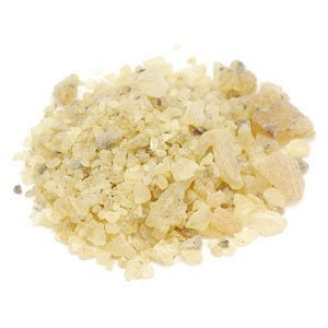May include: A close-up of a pile of pale yellow resin, also known as frankincense, used in incense and aromatherapy.