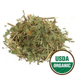 May include: A pile of dried, green, leafy herbs with stems. The herbs are labeled "USDA Organic".
