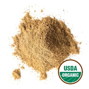 May include: A pile of light brown powder, possibly a spice or herb, against a white background. The USDA Organic seal is visible in the lower right corner, indicating organic certification. The powder appears finely ground and textured.