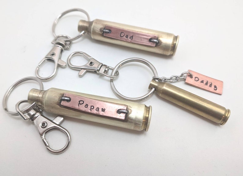 this personalized keychain features a recycled shell casing with a personalized plate on top. It makes a great gift for a grandfather dad, brother, or the hunter in your life or can create it in memory of a special loved one.