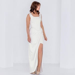 Odette - ivory wedding dress with bows and a slit