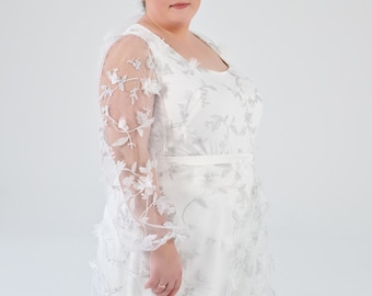 Azura - bridal bodysuit in 3D flowers fabric, with a soft square neckline and see through poet sleeves.