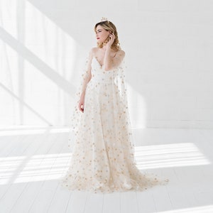 Weddings Category Winner: Etsy Design Awards 2020 - Estelle - celestial wedding dress / bridal gown with silver and gold sequin stars