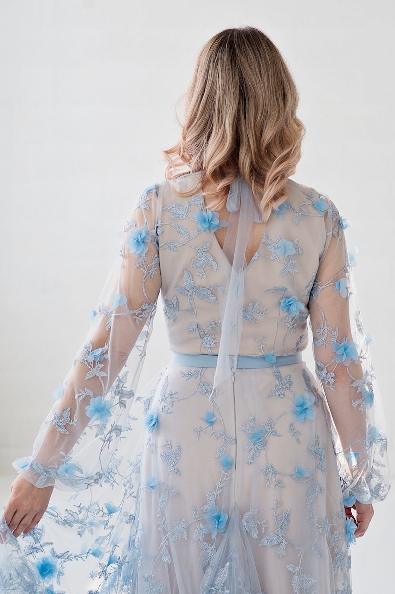 Azura blue bridal bodysuit in 3D flowers fabric, with a soft square neckline and see through poet sleeves. image 4