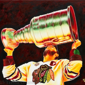 May include: A painting of a hockey player in a yellow and black jersey holding the Stanley Cup. The cup is gold with red and green accents. The player is looking up at the cup with a look of triumph. The background is dark red.
