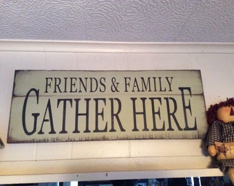 friends and family gather here  sign