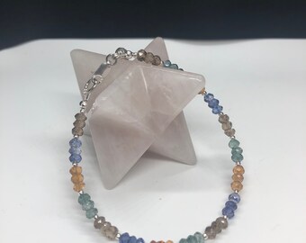 Multi tone quartz bracelet with silver accents